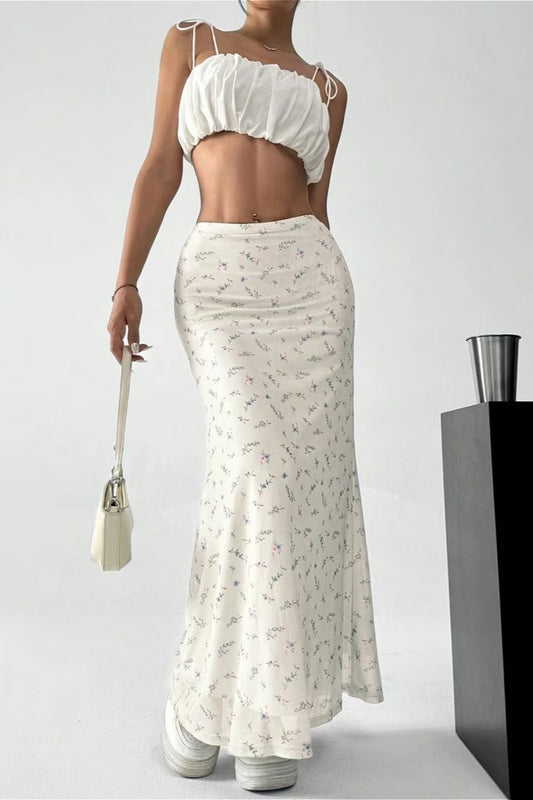 Jupe midi trapèze en satin fleuri