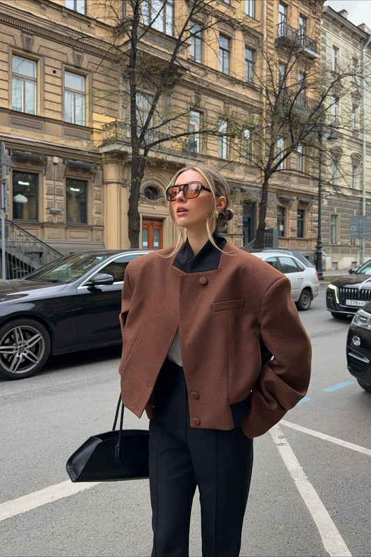 Manteau uni à épaules rembourrées