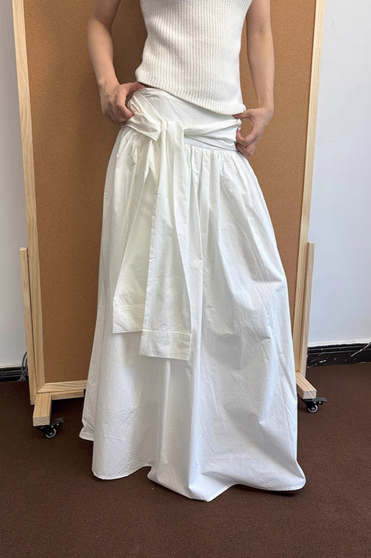 Jupe longue trapèze minimaliste à taille nouée