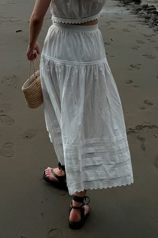 Jupe longue asymétrique à empiècements en dentelle