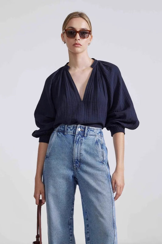 Jean droit taille haute à coutures incurvées