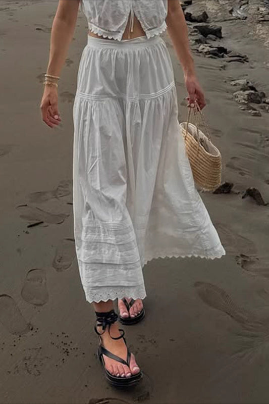 Jupe longue asymétrique à empiècements en dentelle