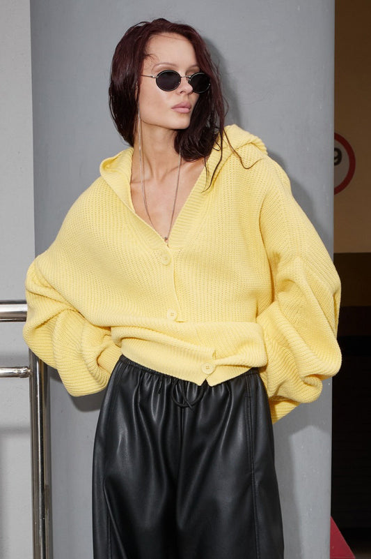 Sweat à capuche boutonné de couleur unie