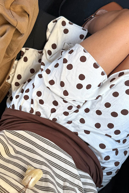 Mini-jupe asymétrique à pois et blocs de couleurs