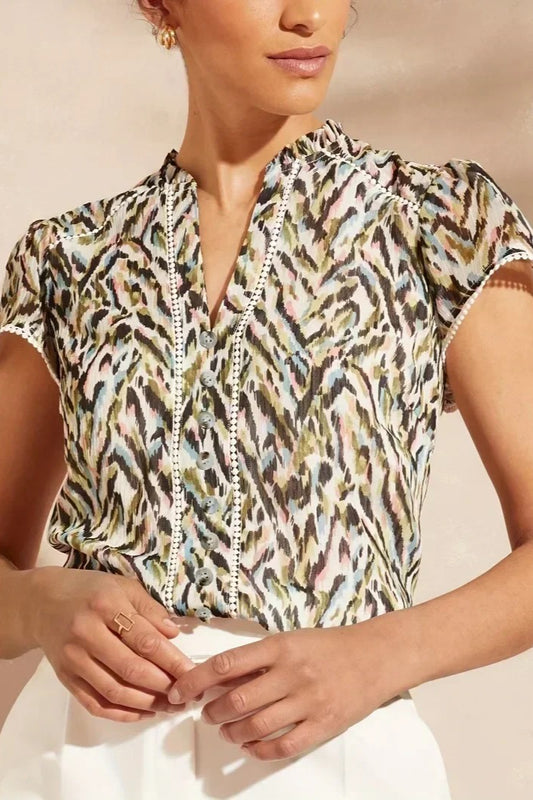 Chemisier élégant à col en V et détails en dentelle