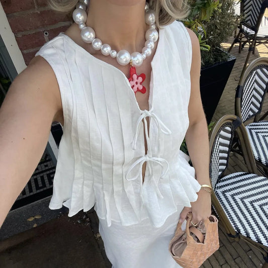 Haut court plissé à volants et découpes