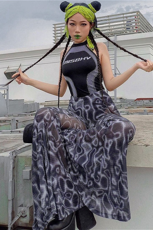 Pantalon évasé taille haute en maille fleurie