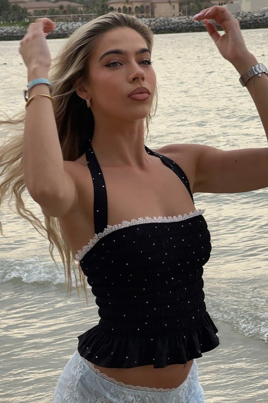 Haut court à pois et volants avec lien à nouer