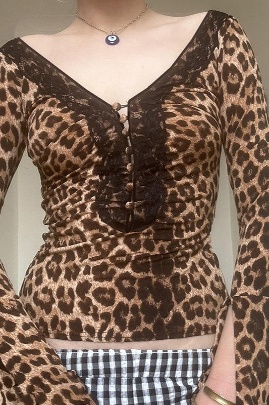 Chemisier à découpes et dos nu à col en V