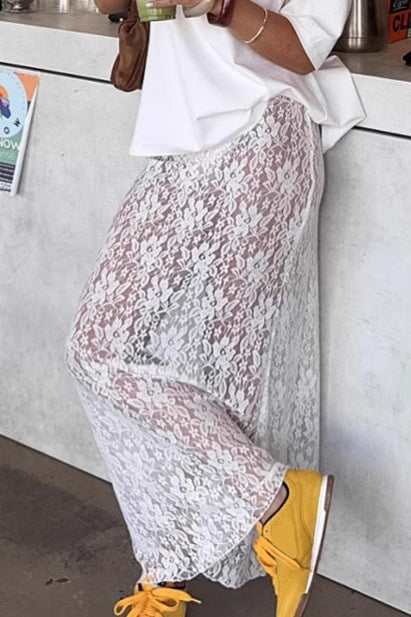 Jupe mi-longue trapèze taille haute en dentelle blanche élégante