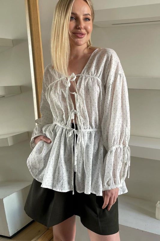 Haut court ample à manches longues et col en V