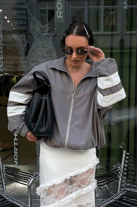 Veste chic à col montant et blocs de couleurs