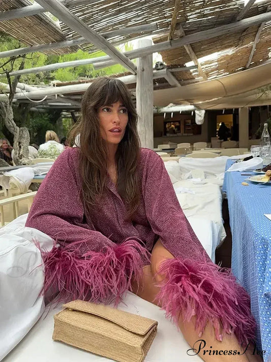 Manteau à col montant en patchwork de plumes brillantes et solides