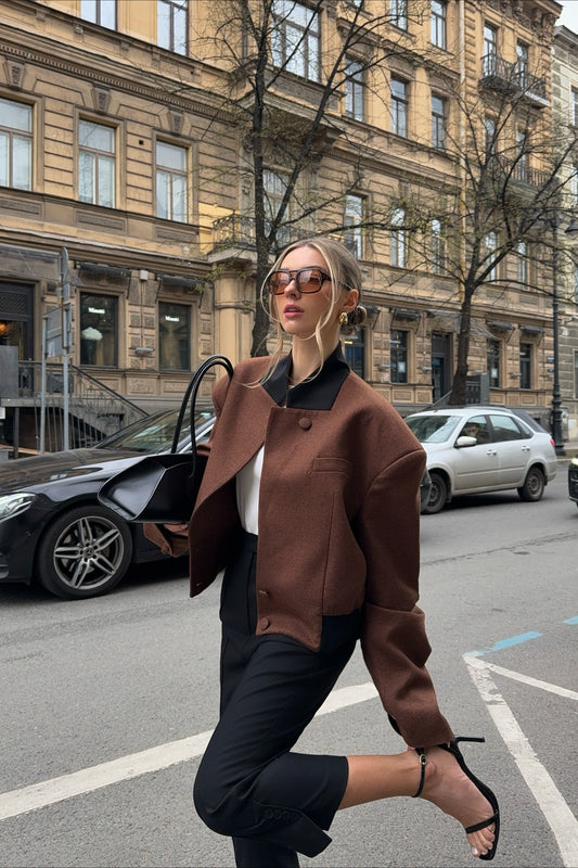 Manteau uni à épaules rembourrées