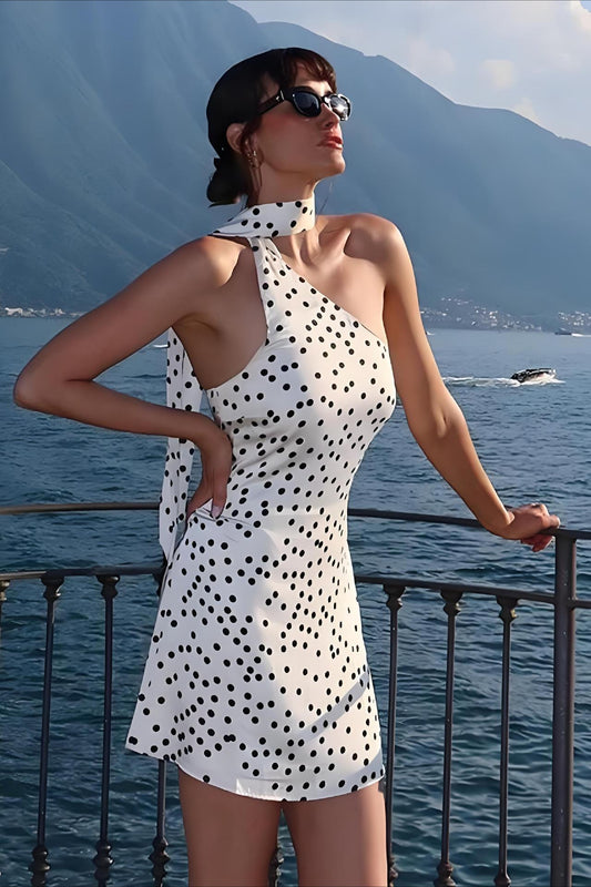 Mini-robe moulante dos nu à pois