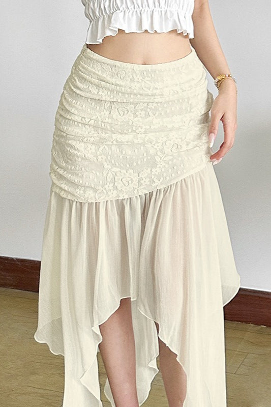 Jupe asymétrique en maille taille haute