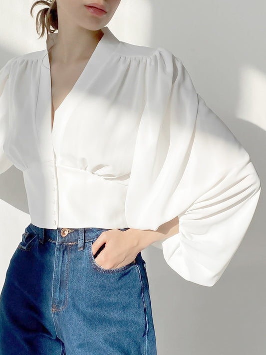 Chemisier vintage à manches lanternes et col en V, coupe ajustée