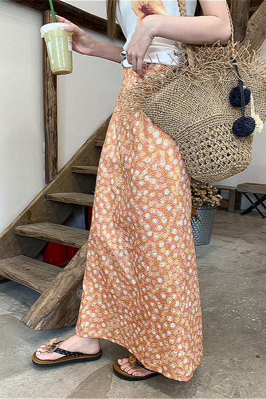 Jupe midi trapèze orange fleurie