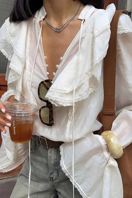 Chemisier à col en V et bordure en dentelle nouée