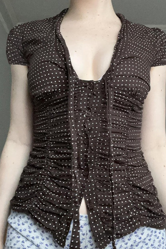 Chemisier à pois avec ceinture boutonnée et nouée à la taille