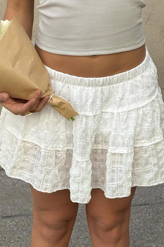 Jupe trapèze taille basse en patchwork texturé