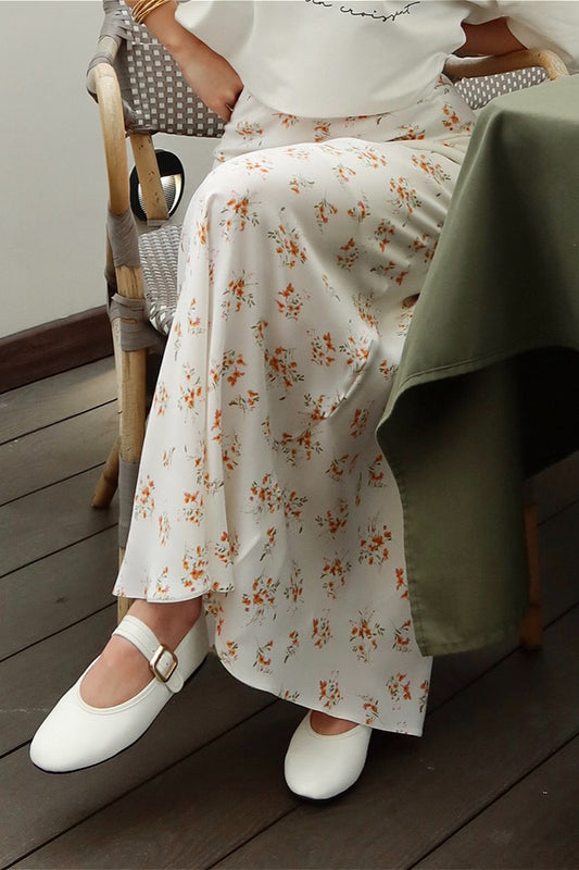 Jupe drapée taille haute en satin à imprimé floral