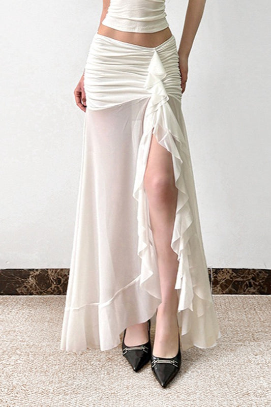 Jupe longue à volants et empiècements en maille avec détails noués