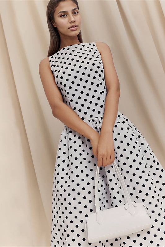 Robe longue chic à pois sans manches