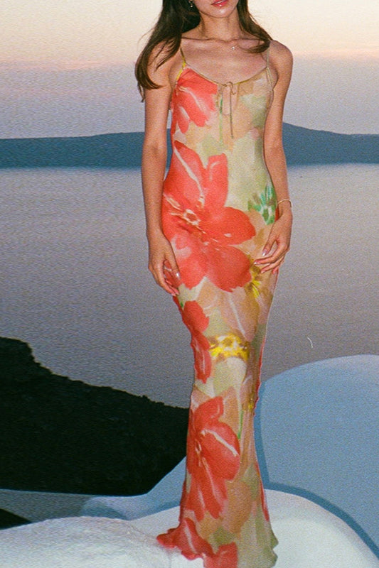 Robe longue caraco fleurie à découpes et lien dans le dos