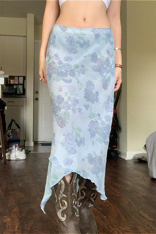 Jupe amincissante asymétrique en maille florale