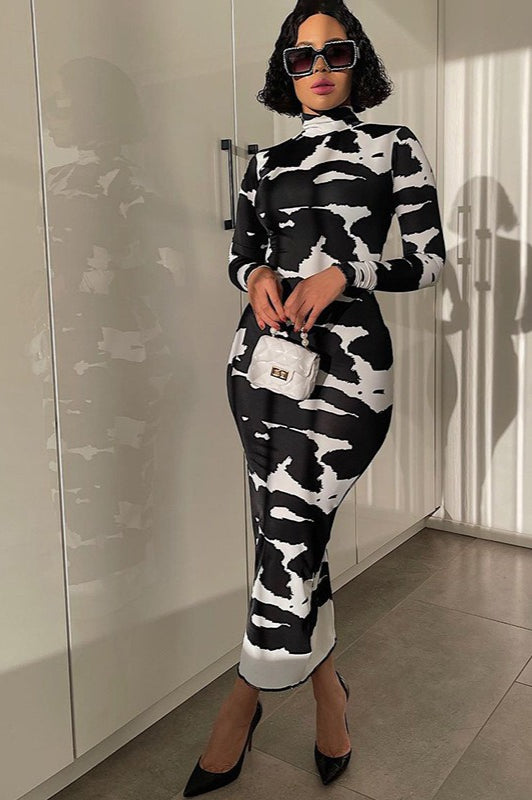 Robe longue moulante à imprimé floral, col haut et manches longues