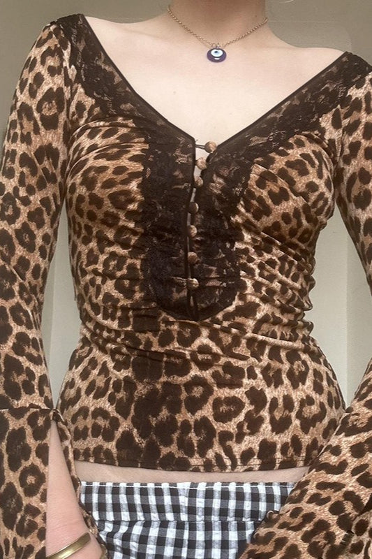 Chemisier à découpes et dos nu à col en V