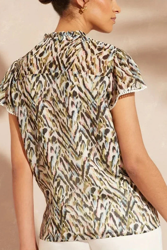 Chemisier élégant à col en V et détails en dentelle