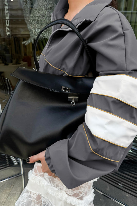 Veste chic à col montant et blocs de couleurs