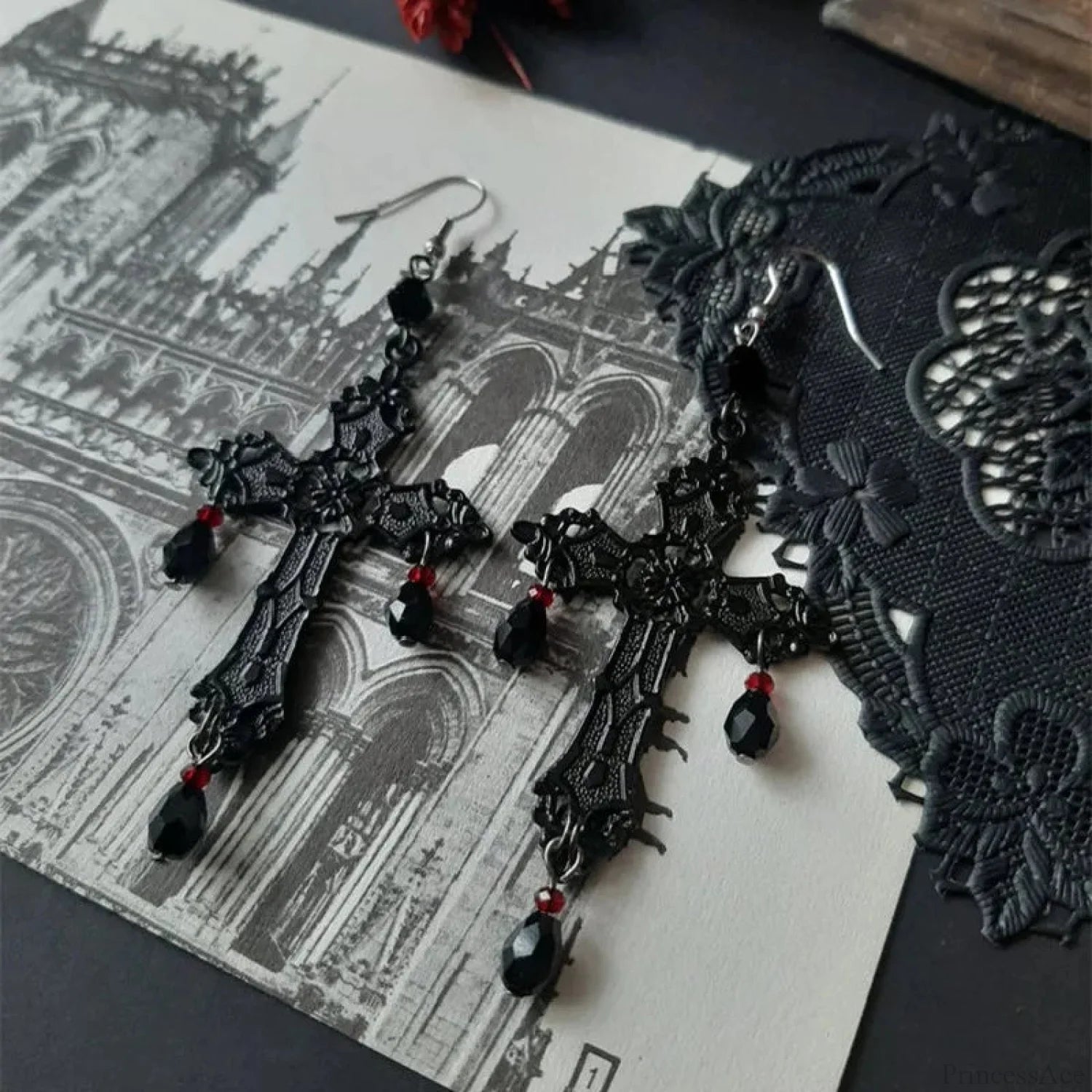 Rebel Celestial Cross Silver Empty Heart Earring black